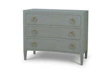 Load image into Gallery viewer, The Mornington Linen Wrapped 3 Drawer Chest pairs a clean, tailored silhouette with the subtle texture of painted linen. Built with a solid mahogany frame beneath the wrapped finish, it offers the structure and weight of fine case goods with a softer, more decorated surface. Three spacious drawers, tapered legs, and brass ring hardware. Good Bones Furniture