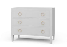 Load image into Gallery viewer, The Mornington Linen Wrapped 3 Drawer Chest pairs a clean, tailored silhouette with the subtle texture of painted linen. Built with a solid mahogany frame beneath the wrapped finish, it offers the structure and weight of fine case goods with a softer, more decorated surface. Three spacious drawers, tapered legs, and brass ring hardware. Good Bones Furniture