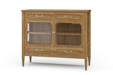 Load image into Gallery viewer, The Bramble Grosvenor Sideboard blends elegant display space with practical storage. Crafted from solid mahogany, it features two glass-front doors, a spacious illuminated interior, and a full-width shelf for displaying glassware, serving pieces, or treasured collections. Four drawers keep smaller essentials neatly organized. Bamboo-inspired moldings, tapered legs, and brass-finished hardware lend the piece a refined, tailored character. Good Bones Furniture