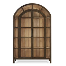 Load image into Gallery viewer, The Vannes 2 Door Display Cabinet from Bramble combines architectural scale with warm natural materials, creating a statement piece designed for both storage and display. Crafted from solid mahogany, the cabinet features a dramatic arched silhouette with glass-paneled doors framed in a rich contrasting finish that highlights the craftsmanship and curvature of the design. Good Bones Furniture