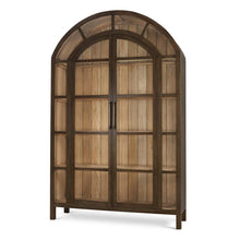 Load image into Gallery viewer, The Vannes 2 Door Display Cabinet from Bramble combines architectural scale with warm natural materials, creating a statement piece designed for both storage and display. Crafted from solid mahogany, the cabinet features a dramatic arched silhouette with glass-paneled doors framed in a rich contrasting finish that highlights the craftsmanship and curvature of the design. Good Bones Furniture