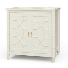 Load image into Gallery viewer, Elevate your bathroom with the Grosvenor Single Vanity, where classic design meets customizable luxury. Featuring beautiful faux bamboo fretwork on two cabinet doors, this piece brings timeless elegance with a touch of coastal and vintage charm. Good Bones Furniture