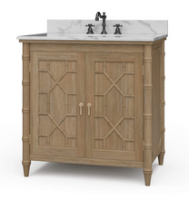 Load image into Gallery viewer, Bring a touch of classic charm & modern sophistication to your bathroom with the Bramble Grosvenor Single Vanity. Featuring gorgeous faux bamboo fretwork on its two cabinet doors, this piece is a true showstopper that blends timeless design with functional luxury. Crafted from solid mahogany and available in a variety of finishes, this vanity is topped with a luxurious marble countertop and integrated sink. Good Bones Furniture
