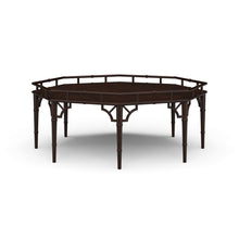 Load image into Gallery viewer, The Bramble Grosvenor Thrupence Coffee Table brings sculptural form and classic British-inspired detailing into a bold statement piece designed for sophisticated living spaces. Crafted from solid mahogany, the octagonal silhouette is framed by an architectural bamboo-inspired gallery rail that gives the table its distinctive presence and refined character. Good Bones Furniture