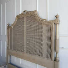 Load image into Gallery viewer, The Frontgate Beauvier French Cane Bed brings timeless Louis XVI style to the bedroom with elegant straight lines, classical ornament, and warm natural texture. Crafted from solid mahogany, it features handwoven double cane panels, twisted ribbon carving, floral swag and laurel wreath detailing, and beaded accents along the rails and finials. Good Bones Furniture