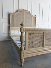 Load image into Gallery viewer, The Frontgate Beauvier French Cane Bed brings timeless Louis XVI style to the bedroom with elegant straight lines, classical ornament, and warm natural texture. Crafted from solid mahogany, it features handwoven double cane panels, twisted ribbon carving, floral swag and laurel wreath detailing, and beaded accents along the rails and finials. Good Bones Furniture