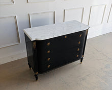 Load image into Gallery viewer, This gently used Regency bow front chest by Frontgate brings classic glamour and tailored storage to the bedroom, entry, or living space. The glossy ebony finish is paired with a Carrara marble top, handpainted gold beading, and gold-accented corner carvings for a refined, high-contrast look. Good Bones Furniture