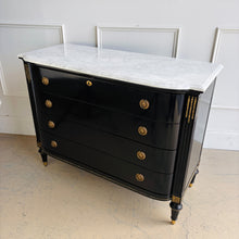 Load image into Gallery viewer, This gently used Regency bow front chest by Frontgate brings classic glamour and tailored storage to the bedroom, entry, or living space. The glossy ebony finish is paired with a Carrara marble top, handpainted gold beading, and gold-accented corner carvings for a refined, high-contrast look. Good Bones Furniture