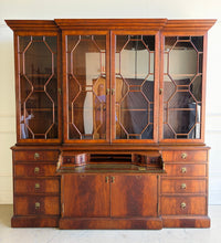 Load image into Gallery viewer, The Jonathan Charles Mahogany Breakfront Secretary Bookcase is a statement piece that combines the functionality of a library cabinet, secretary desk, display cabinet, and storage credenza in a single heirloom-quality design. Crafted with richly figured flame mahogany veneers, the cabinet showcases the level of craftsmanship that has made Jonathan Charles a respected name among collectors, designers, and luxury furniture retailers. Good Bones Furniture