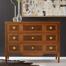Load image into Gallery viewer, Experience the perfect blend of artistry and craftsmanship with the Modern History Chambery Chest. A masterful combination of walnut, maple, and cherry veneers creates a rich tapestry of color and texture, highlighting the natural beauty and subtle variations of fine wood grains. The elegant silhouette and clean lines provide a timeless appeal that easily complements both traditional and contemporary interiors.