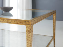 Load image into Gallery viewer, The Modern History Sculpture Cocktail Table brings striking texture and clean architectural lines to the center of a living space. Crafted with a hammered antique brass finish, the rectangular frame has a sculptural presence that feels both modern and timeless. Good Bones Furniture