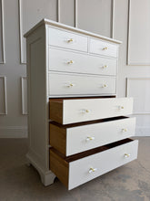 Load image into Gallery viewer, This Newport Cabinet Company chest has been professionally lacquered in Benjamin Moore Natural Cream for a bright, elegant finish that highlights its timeless design. Seven deep drawers provide generous vertical storage. Good Bones Furniture