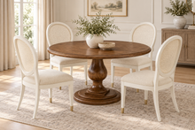 Load image into Gallery viewer, The Phillips Scott 48 inch Lafayette Dining Table offers the character of a grand European pedestal table in a comfortably scaled footprint. Designed to seat four, it is an inviting choice for breakfast rooms, dining nooks, and smaller dining spaces. Crafted from hardwood solids and veneers, its round top features a layered molded edge supported by a sculptural turned pedestal and substantial tiered base. Good Bones Furniture