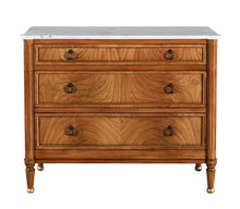 Load image into Gallery viewer, Elegant and effortlessly functional, the Riley Mahogany Chest pairs classic proportions with luxe details. A cerejeira (Brazilian oak) veneer creates a striking feathered grain across the drawer fronts, framed by subtle gold trim that’s echoed on the turned feet. Finished in a warm mahogany tone with mahogany or marble top and fitted with antique brass ring pulls, Riley brings tailored sophistication to bedrooms, entryways, or living spaces while offering generous, everyday storage. Good Bones Furniture