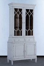 Load image into Gallery viewer, Elevate your dining or living space with the timeless elegance of the Rosalind China Cabinet. Handcrafted from solid mango wood and mango wood veneers, this cabinet combines durability with natural beauty, showcasing the wood's rich, warm tones and unique grain patterns. Its sleek design is complemented by solid brass hardware, adding a touch of refined sophistication. Good Bones Furniture