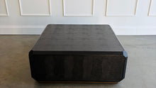 Load image into Gallery viewer, The Spencer St. James Square Cocktail Table by Theodore Alexander combines bold contemporary form with richly tactile materials. Crafted from oak wood and crocodile-embossed leather, its substantial square silhouette features clipped corners that soften the strong architectural lines. Good Bones Furniture