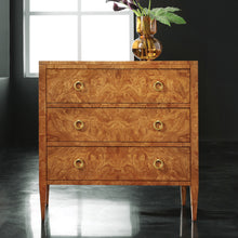 Load image into Gallery viewer, The Modern History Three Drawer Chest on Legs highlights the dramatic character of olive ash burl, prized for its swirling grain and rich natural variation. The clean, tailored silhouette allows the burl veneer to take center stage, creating a piece that feels both refined and visually striking. Good Bones Furniture