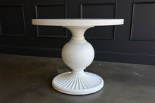 Load image into Gallery viewer, The Marco Center Table from Tommy Bahama’s Ocean Breeze collection pairs a clean round top with a sculptural pedestal base. Its urn-shaped center and radiating fluted base give the table graceful architectural detail while maintaining a relaxed, versatile appearance. Professionally lacquered in the color of your choice by Good Bones Furniture.