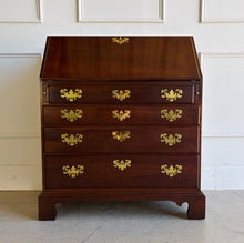 Load image into Gallery viewer, This traditional Chippendale mahogany secretary combines classic American craftsmanship with everyday functionality in a compact footprint. Crafted in rich mahogany with a warm satin finish, it features a slant-front writing surface that opens to reveal a thoughtfully organized interior complete with pigeonholes, two small drawers, and a center cabinet for storing stationery and essentials. Good Bones Furniture