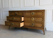 Load image into Gallery viewer, This handsome six-drawer dresser by Vanguard Furniture blends tailored lines with refined transitional styling. Crafted with beautifully grained oak veneers, it features sculpted drawer fronts, oversized antiqued brass ring pulls, and elegantly tapered legs that give the piece a sophisticated presence. Good Bones Furniture