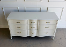 Load image into Gallery viewer, Elegant curves, classic proportions, and the kind of quality Drexel is known for make this vintage French dresser an easy choice for a custom lacquer finish. With nine drawers and a beautifully shaped front, it offers generous storage while keeping a light, refined silhouette. The cabriole-style legs and subtle molded details give it that timeless French character. Good Bones Furniture