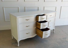 Load image into Gallery viewer, Elegant curves, classic proportions, and the kind of quality Drexel is known for make this vintage French dresser an easy choice for a custom lacquer finish. With nine drawers and a beautifully shaped front, it offers generous storage while keeping a light, refined silhouette. The cabriole-style legs and subtle molded details give it that timeless French character. Good Bones Furniture