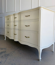 Load image into Gallery viewer, Elegant curves, classic proportions, and the kind of quality Drexel is known for make this vintage French dresser an easy choice for a custom lacquer finish. With nine drawers and a beautifully shaped front, it offers generous storage while keeping a light, refined silhouette. The cabriole-style legs and subtle molded details give it that timeless French character. Good Bones Furniture
