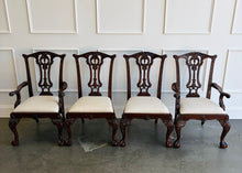 Load image into Gallery viewer, This vintage Drexel Heritage Nine Elms dining set showcases richly figured crotch mahogany veneer framed by contrasting banding. The expansive table rests on two ornately carved pedestal bases and includes three 22-inch leaves, extending it to an impressive 140 inches for large gatherings. Eight coordinating chairs—two armchairs and six side chairs. Good Bones Furniture