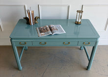 Load image into Gallery viewer, This vintage Lane Furniture writing desk features a restrained Asian-inspired silhouette with softly rounded corners, inset panel detailing, and sculptural legs connected by low stretchers that give the piece a grounded, furniture-quality presence. Custom lacquered teal. Good Bones Furniture