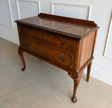 Load image into Gallery viewer, This vintage Queen Anne-style two drawer chest features richly figured wood grain, graceful cabriole legs, carved corner details, and classic brass hardware. The compact scale makes it especially versatile as a bedside chest, entryway piece, small dresser, or accent cabinet. Good Bones Furniture