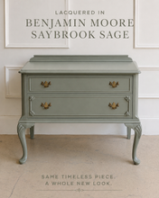 Load image into Gallery viewer, This vintage Queen Anne-style two drawer chest features richly figured wood grain, graceful cabriole legs, carved corner details, and classic brass hardware. The compact scale makes it especially versatile as a bedside chest, entryway piece, small dresser, or accent cabinet. Good Bones Furniture