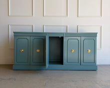 Load image into Gallery viewer, This vintage Stanley credenza with five doors open to three interior cabinet sections, giving you flexible storage for dining, media, or everyday living. The far-left section includes three draw