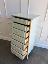 Load image into Gallery viewer, The Vintage Thomasville Allegro Lingerie Chest proves that generous storage does not require a large footprint. Its tall, slender silhouette fits beautifully into smaller bedrooms, dressing rooms, or spaces between windows while providing seven drawers for lingerie, jewelry, accessories, and other everyday essentials. Professionally lacquered in a custom light green by Good Bones Furniture.