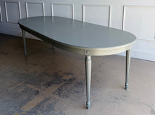 Load image into Gallery viewer, This vintage Thomasville dining table features a clean oval silhouette, tapered fluted legs, and understated neoclassical detailing that gives it a tailored, architectural presence without feeling overly formal. Custom lacquered in Lauriston Stone. Good Bones Furniture