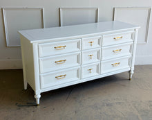 Load image into Gallery viewer, This vintage seven drawer dresser by White Furniture Co. showcases the exceptional craftsmanship and timeless proportions that made the North Carolina manufacturer one of America's most respected furniture makers. Professionally lacquered in White Dove by Benjamin Moore, this piece can complement everything from traditional interiors to today's transitional and modern homes. Good Bones Furniture