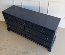 Load image into Gallery viewer, A tailored, heirloom-quality piece from White Furniture Company, known for its exceptional craftsmanship and legacy of producing some of the finest American case goods of the 20th century. This vintage dresser features clean, classic lines with a slightly raised base and understated detailing—giving it a timeless, versatile profile that works across traditional and transitional interiors. Sherwin Williams Naval. Good Bones Furniture