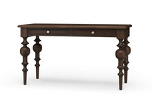 Load image into Gallery viewer, Front view of the Vivienne Desk in Walnut finish by Bramble, a mahogany writing desk with sculptural turned legs and two drawers, crafted in Indonesia and offered by Good Bones Furniture to customers across the United States.