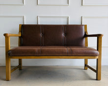 Load image into Gallery viewer, This is a showroom sample in like-new condition. It has been carefully maintained, with excellent frame integrity, consistent finish, and beautifully preserved leather. The piece presents as new and has not been used in a residential setting. Good Bones Furniture