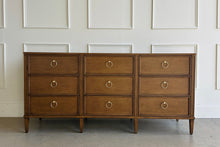 Load image into Gallery viewer, Avalaire 9 Drawer Dresser in Honey Chestnut by Good Bones Furniture, featuring solid mahogany construction, nine spacious soft-close drawers, and refined architectural lines.