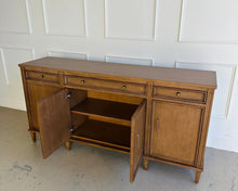 Load image into Gallery viewer, Avalaire Sideboard in Honey Chestnut with center doors open, revealing adjustable interior shelving and soft-close door construction by Good Bones Furniture.