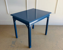 Load image into Gallery viewer, Close angled view of vintage end table lacquered in Benjamin Moore New York State of Mind, saturated blue accent table with smooth sheen and refined silhouette.