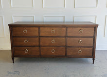 Load image into Gallery viewer, Boylan 9-drawer dresser in Sorrel Mahogany, crafted from solid mahogany and mahogany veneers, featuring soft-close drawers and brass ring pulls