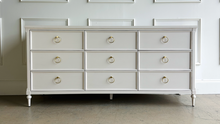 Load image into Gallery viewer, Boylan 9-drawer dresser by Good Bones Furniture in White Dove, made from solid mahogany and mahogany veneers with soft-close drawers, brass ring hardware, and balanced, modern proportions