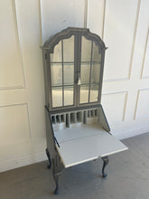 Load image into Gallery viewer, Front view of Queen Anne–style vintage secretary with drop-front desk open and organized interior storage compartments