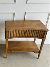 Load image into Gallery viewer, Bring timeless craftsmanship and subtle sophistication to your space with the Taylor Side Table. Crafted from solid mango wood, this versatile piece features a beautifully fluted single drawer front with a false key lock, gracefully curved apron, and elegant tapered legs. An open lower shelf adds both visual balance and extra storage or styling potential. Good Bones Furniture