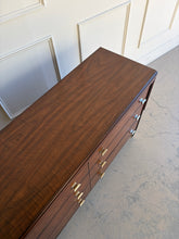 Load image into Gallery viewer, Three-quarter top view of the Theodore Alexander Dorchester Dresser showing the smooth walnut surface, Mayfair finish, and elegant Art Origins detailing at Good Bones Furniture in Raleigh, NC