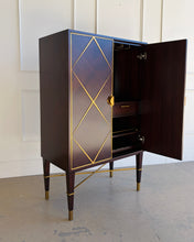 Load image into Gallery viewer, Angled right view of the Theodore Alexander Max bar cabinet with the right door open, showcasing interior storage, wine rack, and functional bar organization