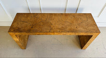 Load image into Gallery viewer, Make a statement with the bold beauty of the Burlwood Console Table. Featuring a sleek, continuous silhouette and book-matched burl veneer, this piece delivers luxurious texture and refined modernism in one dramatic package. Good Bones Furniture