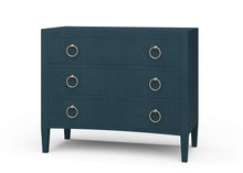 Load image into Gallery viewer, The Mornington Linen Wrapped 3 Drawer Chest pairs a clean, tailored silhouette with the subtle texture of painted linen. Built with a solid mahogany frame beneath the wrapped finish, it offers the structure and weight of fine case goods with a softer, more decorated surface. Three spacious drawers, tapered legs, and brass ring hardware. Good Bones Furniture

