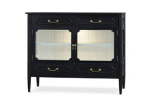 Load image into Gallery viewer, The Bramble Grosvenor Sideboard blends elegant display space with practical storage. Crafted from solid mahogany, it features two glass-front doors, a spacious illuminated interior, and a full-width shelf for displaying glassware, serving pieces, or treasured collections. Four drawers keep smaller essentials neatly organized. Bamboo-inspired moldings, tapered legs, and brass-finished hardware lend the piece a refined, tailored character. Good Bones Furniture
